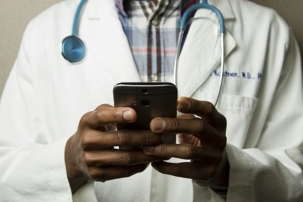 Health worker speaking with a patient