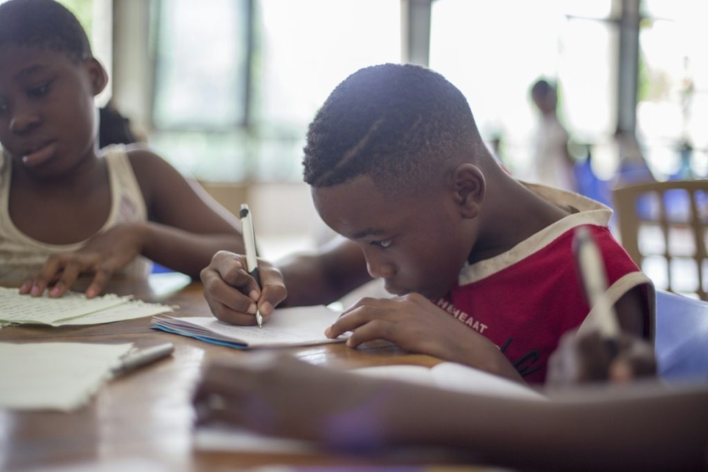 Young people learning together in a group